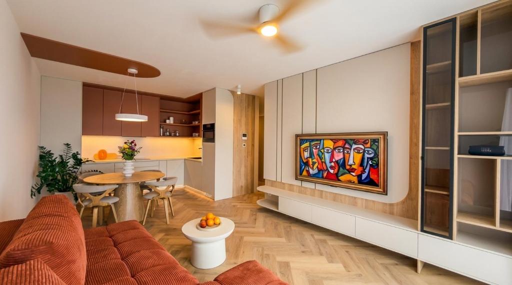 a living room with a couch and a table at Bela Bonita in Spišská Belá