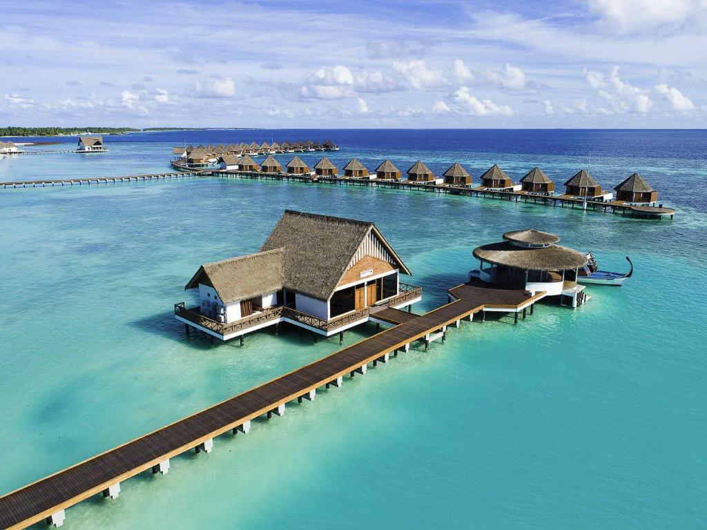 an aerial view of a resort in the water at Mercure Maldives Kooddoo - Adults-Only Escape in Maamendhoo