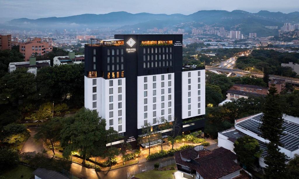 an overhead view of a tall building with a city at Faranda Collection Medellin, a Member of Radisson Individuals in Medellín