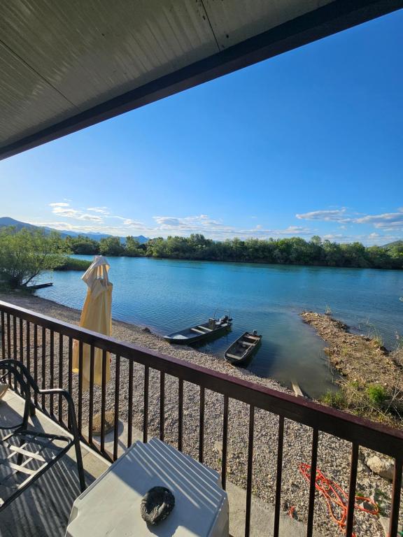 a view of a river from a balcony at Holiday home Ramovic in Virpazar