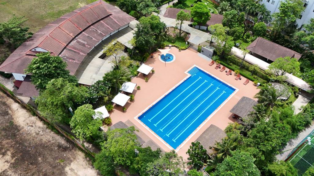 an overhead view of a swimming pool at a resort at Cambodian Country Club in Phnom Penh