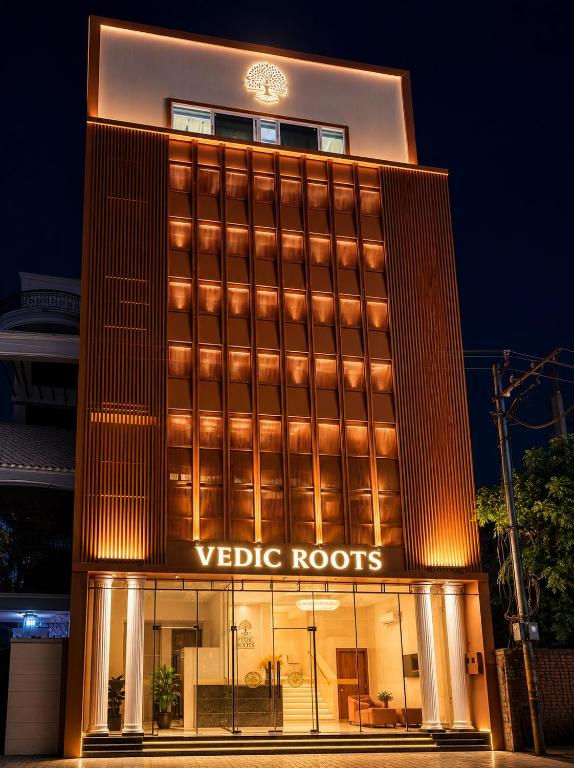 a rendering of the veggie roots hotel at night at Hotel Vedic Roots in Varanasi