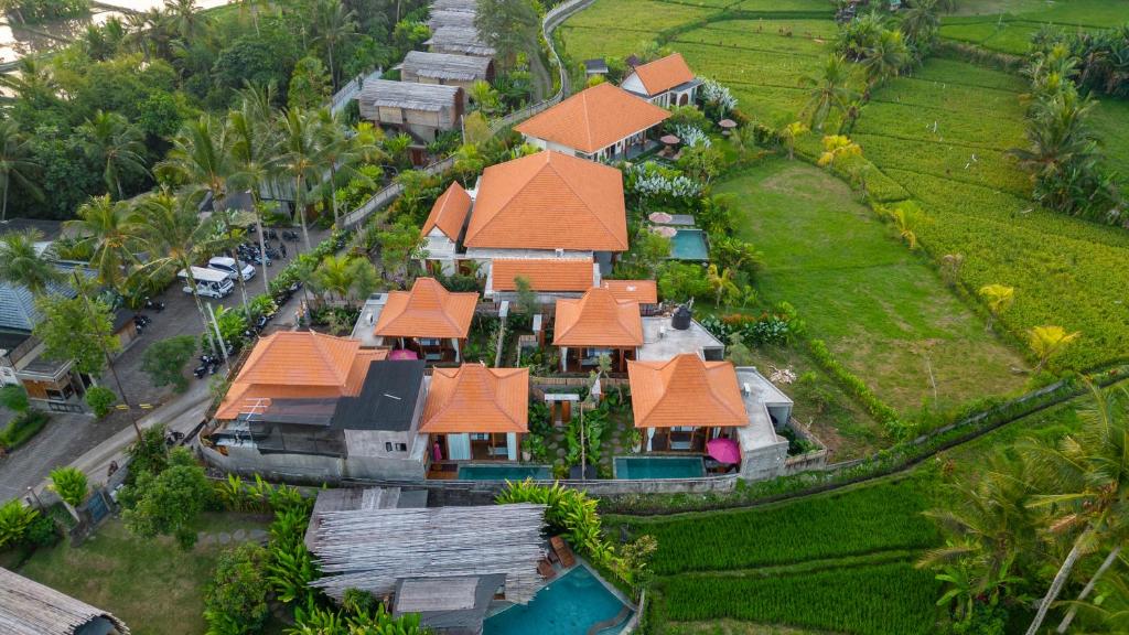 an aerial view of a house with orange roofs at Bi Bi Bliss Ubud Villa in Ubud