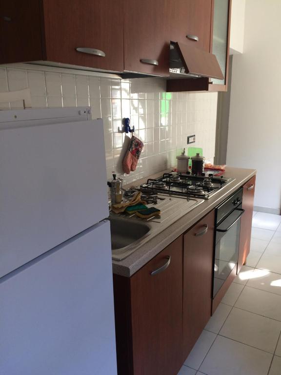 Kuchyňa alebo kuchynka v ubytovaní L'arco di corso Garibaldi 202