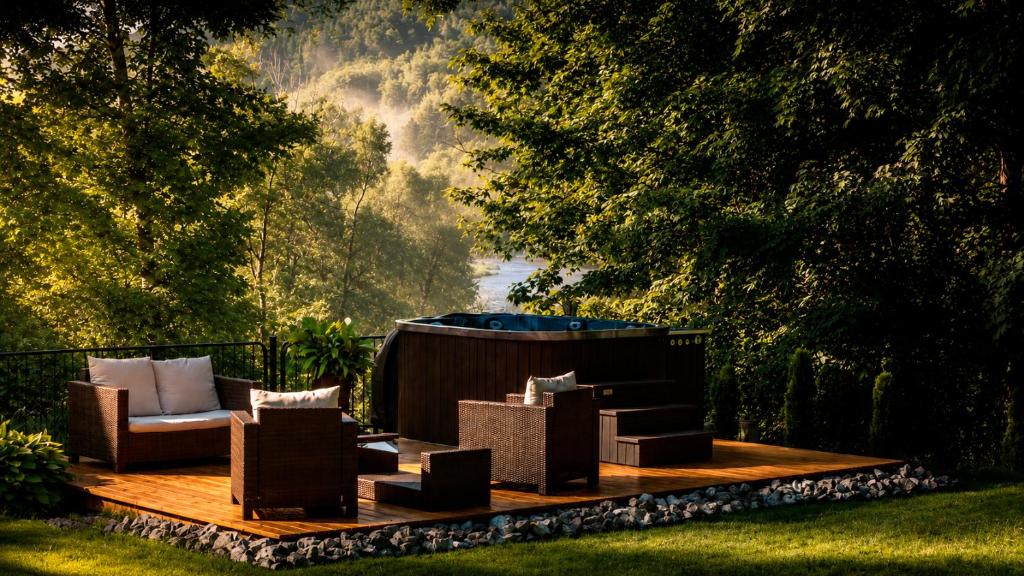 a wooden deck with chairs and a hot tub at Pensjonat Irena in Muszyna