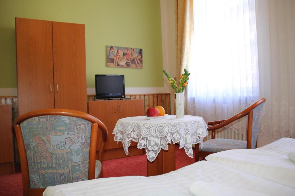 TV a/nebo společenská místnost v ubytování Hotel Central
