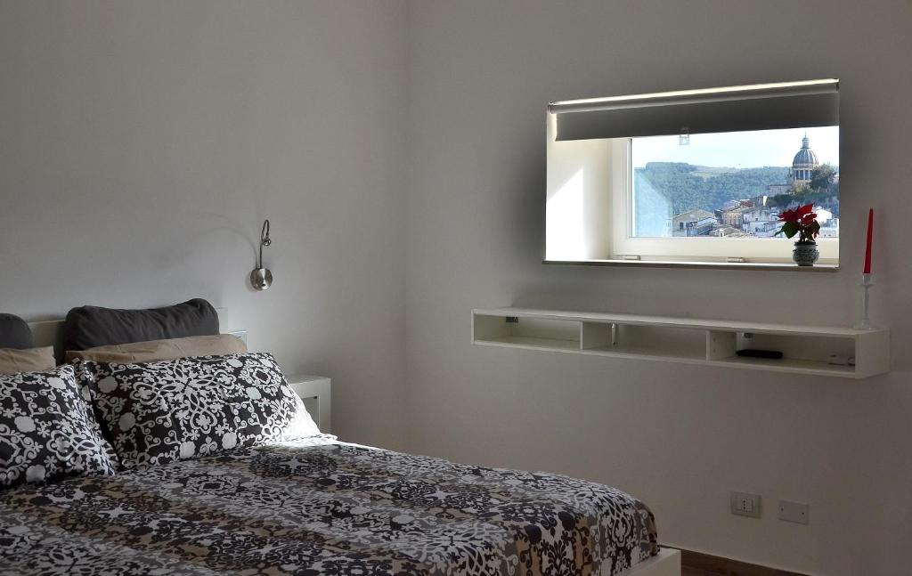 Säng eller sängar i ett rum på Iblachiara