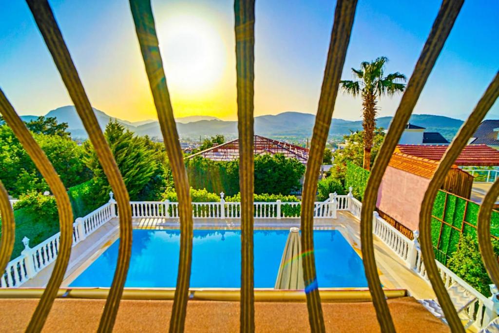 a view of a swimming pool from a house at Summerdays in the Med in Fethiye