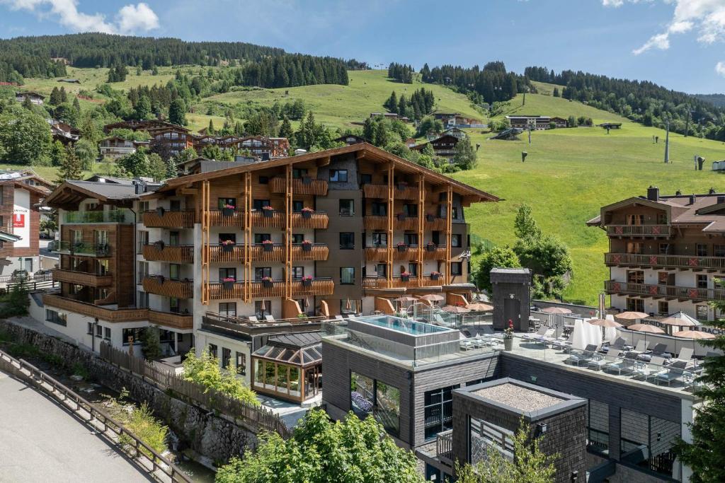 an aerial view of a hotel in the mountains at Hotel Kendler in Saalbach-Hinterglemm