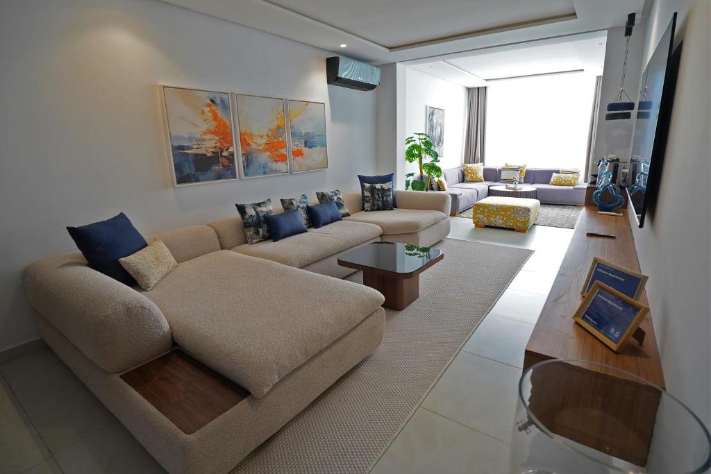 a living room with a couch and a table at InHome Apartment F2 in Cabo Negro