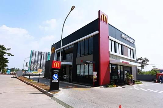 a mcdonalds building with a sign in front of it at Reverdale in Bekasi