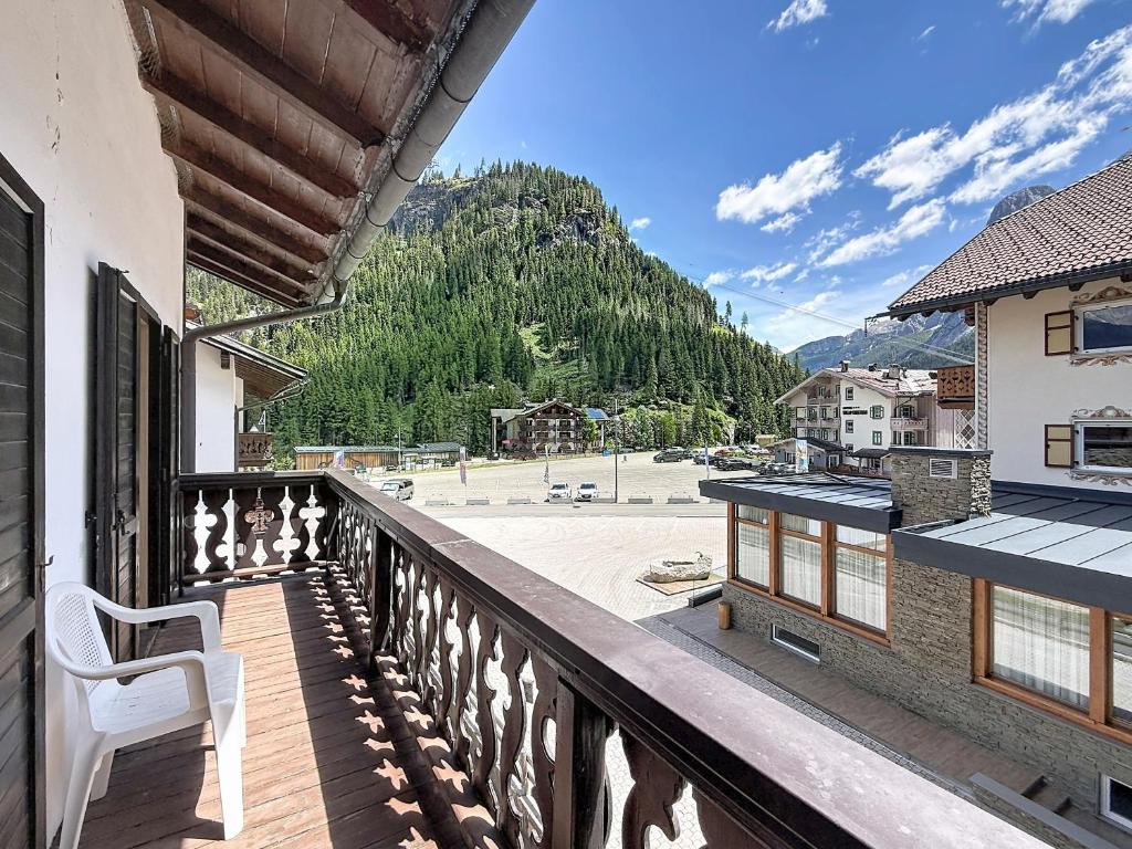 a balcony with a view of a mountain at Cesa Fraines - Apt 28 in Alba di Canazei