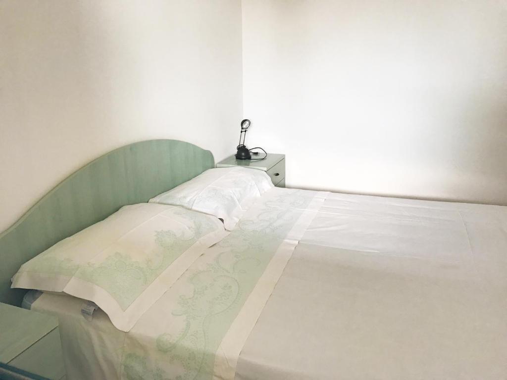 Postel nebo postele na pokoji v ubytování Camping Porto Miggiano