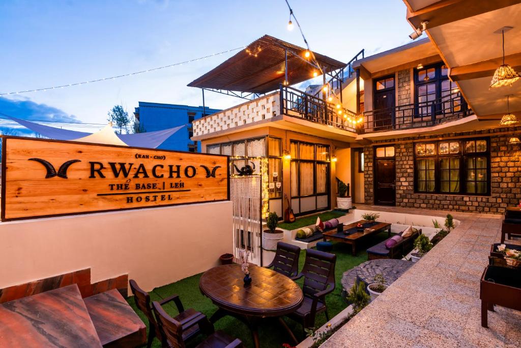 a house with a yard with a patio at RWACHO Hostel The Base in Leh