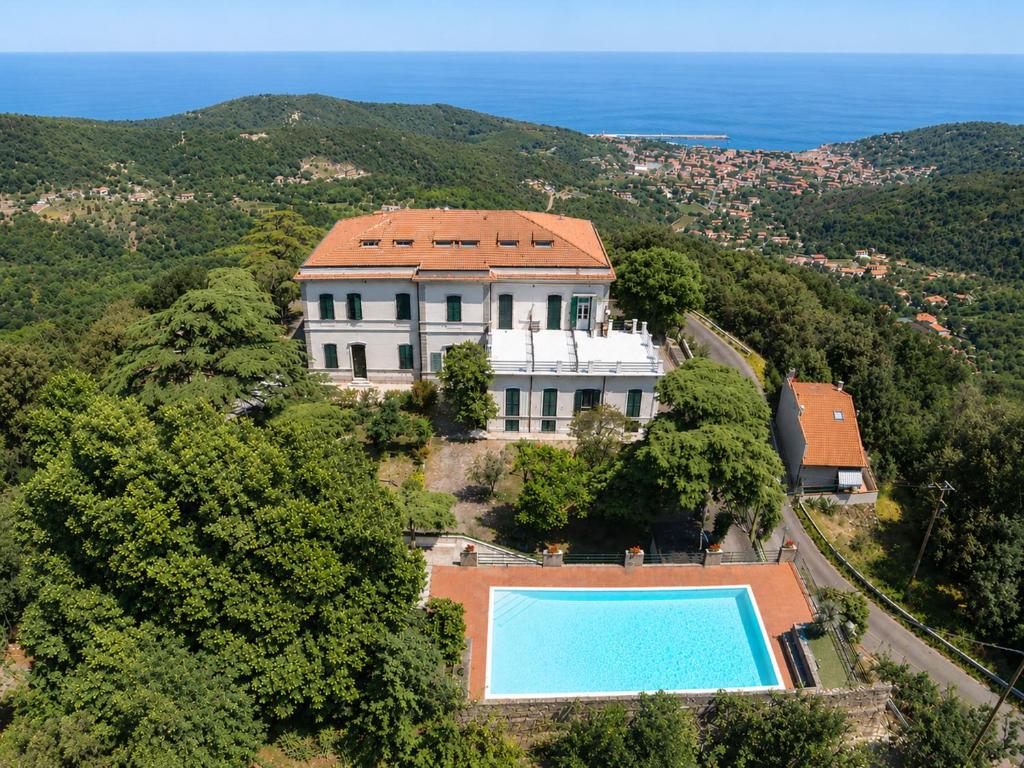 an aerial view of a house with a swimming pool at Appartamenti Napoleone al Poggio - ArgonautiVacanze in Poggio