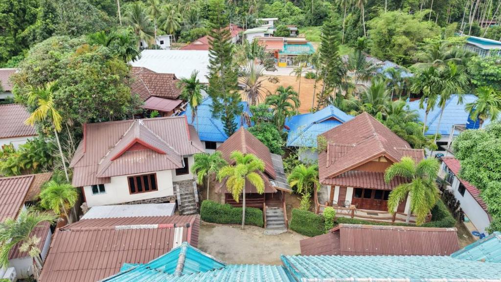 an overhead view of a village with houses and trees at Buddha Raksa in Thong Nai Pan Yai