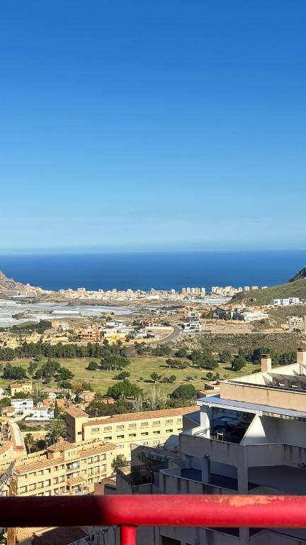 a view of the ocean from the balcony of a building at La Envía Terraza in La Envia