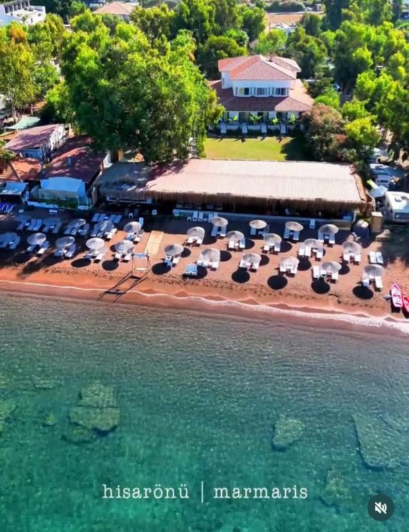 an aerial view of a resort on the beach at Thanos Hotel in Muğla