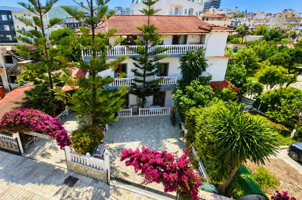 an aerial view of a house with flowers and trees at Garden Villa Veli in Ksamil