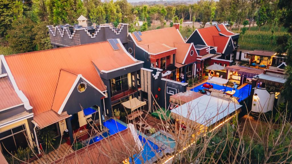 an aerial view of a house with orange roofs at Unique Homestay in Karatu