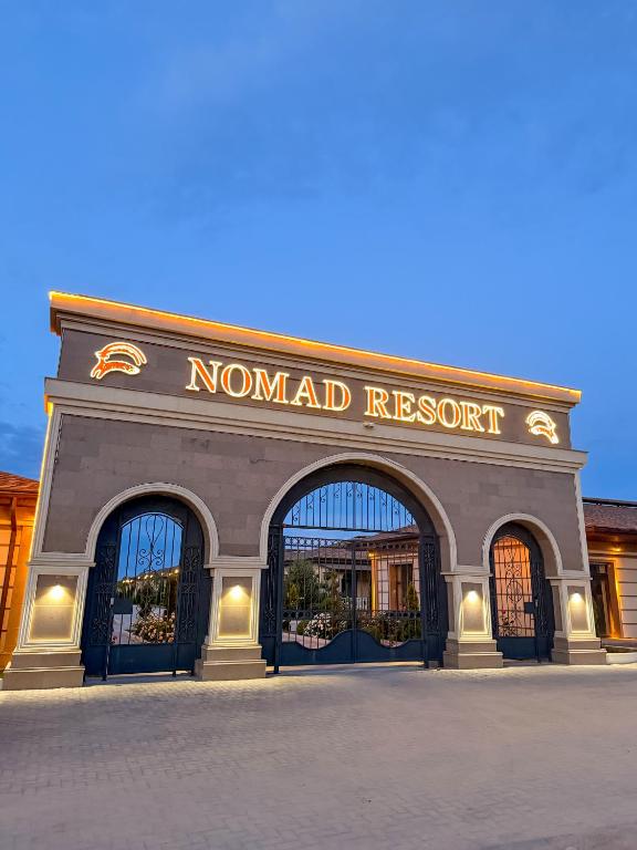a front entrance to a nordland resort building at Nomad Resort Cholpon-Ata in Cholpon-Ata
