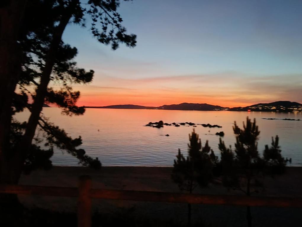 a view of a lake at sunset at Casasa in Vigo