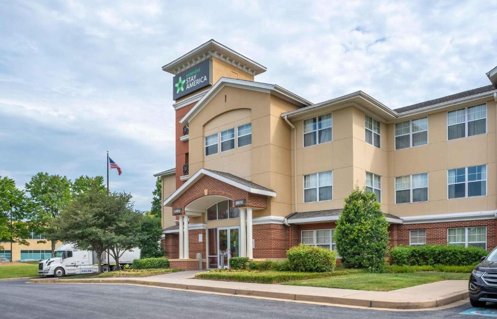 a hotel building with a sign on top of it at Extended Stay America Suites - Columbia - Columbia Corporate Park in Columbia