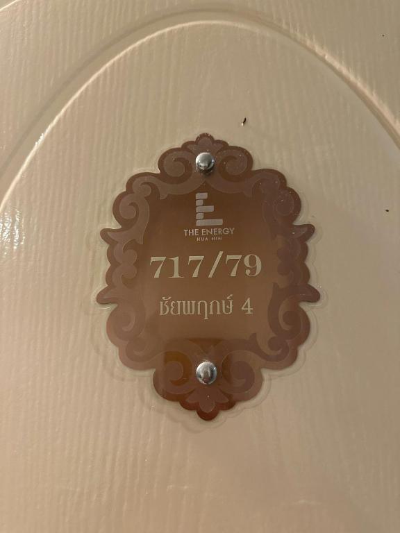 a plate with a chocolate sign on the ceiling at wongwian N in Ban Bo Khaem