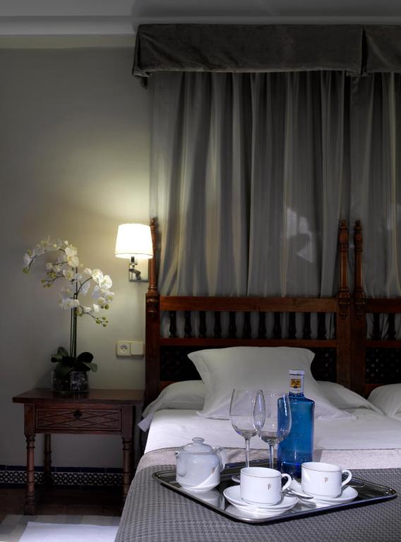 Posteľ alebo postele v izbe v ubytovaní Parador de Carmona