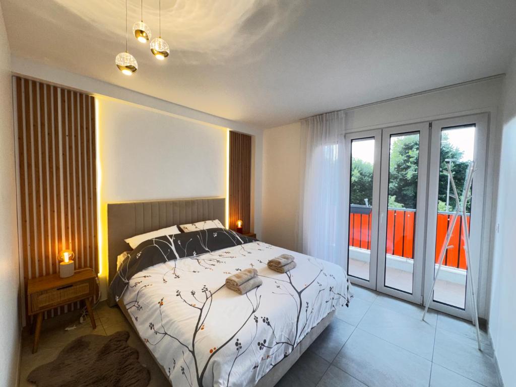 Appartement 2 Chambres - Terrasse, Parking Gratuit & Climatisation