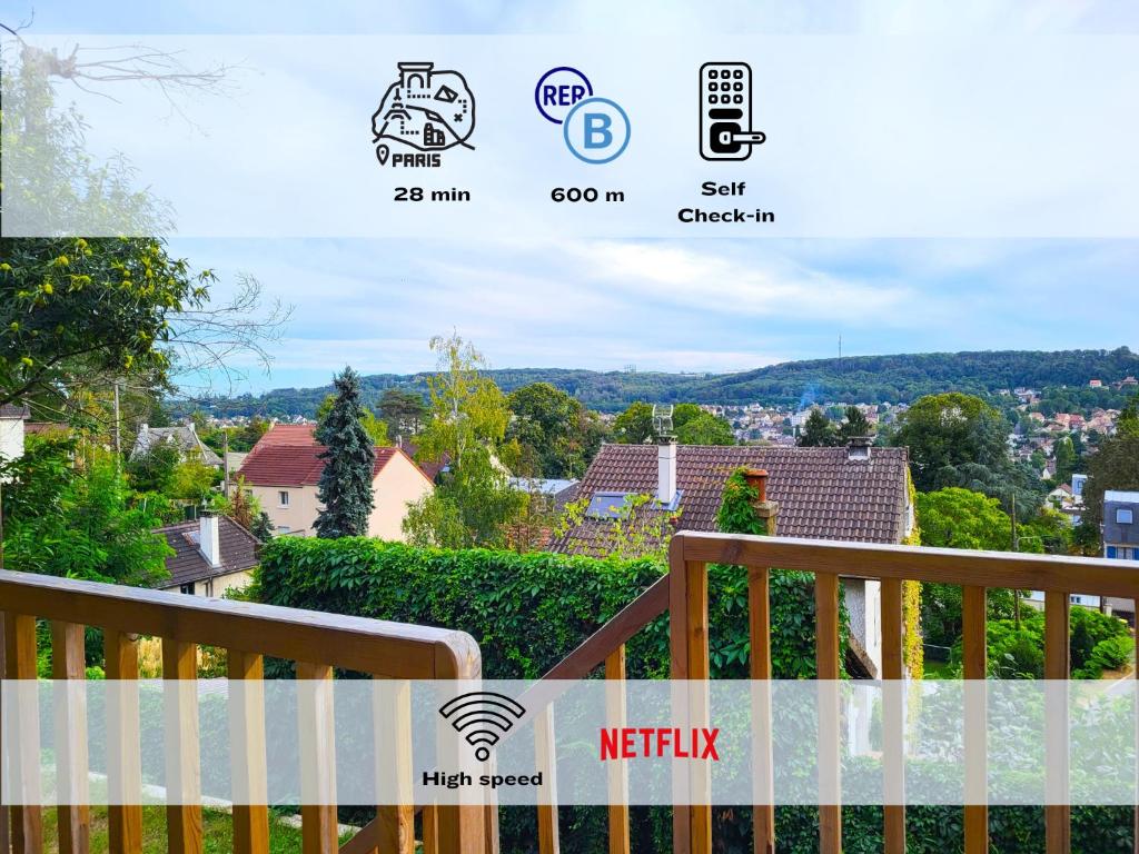 a view from a balcony of a house at Le Bellevue - Beaux appartements avec vue splendide in Palaiseau