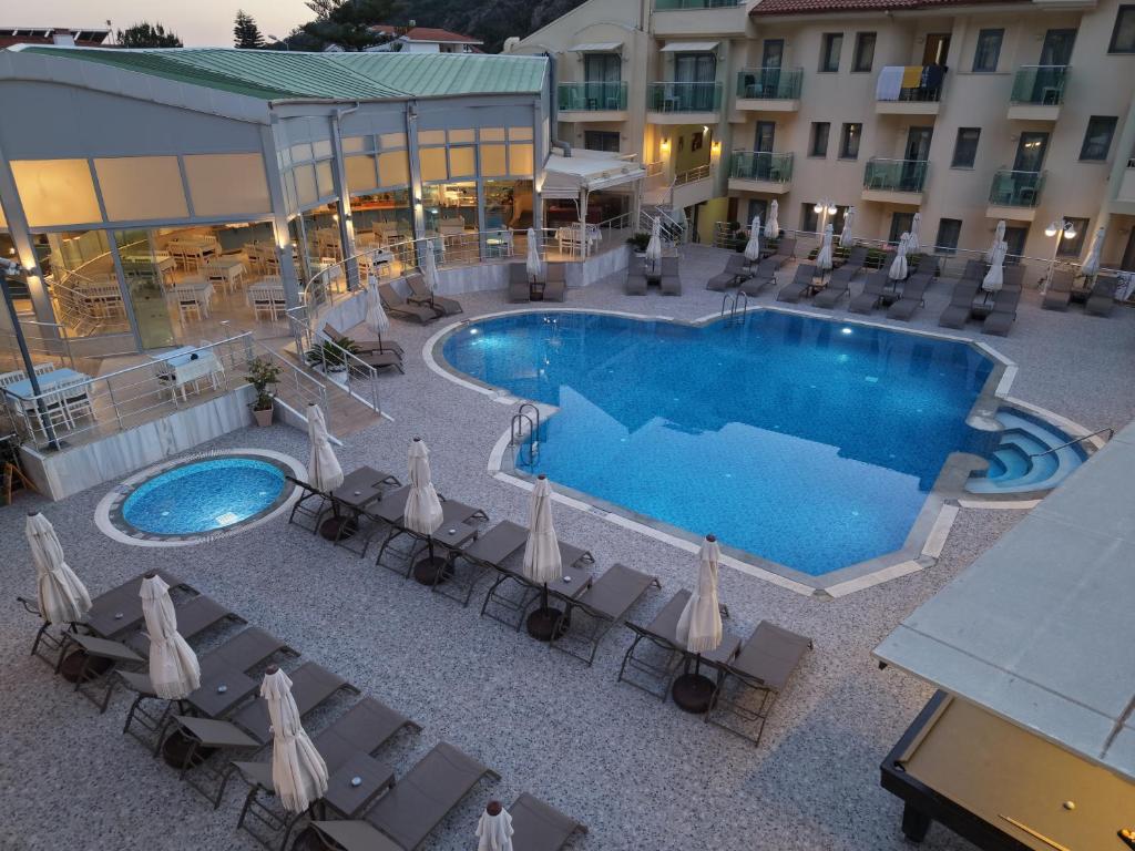 an overhead view of a swimming pool in a hotel at Belcehan Hotel in Oludeniz
