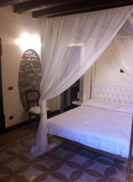 Postel nebo postele na pokoji v ubytování B&B Al Convento
