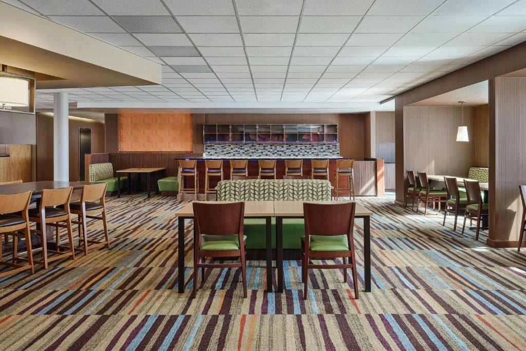 a rendering of a conference room with a table and chairs at Fairfield Inn & Suites by Marriott Sidney in Sidney