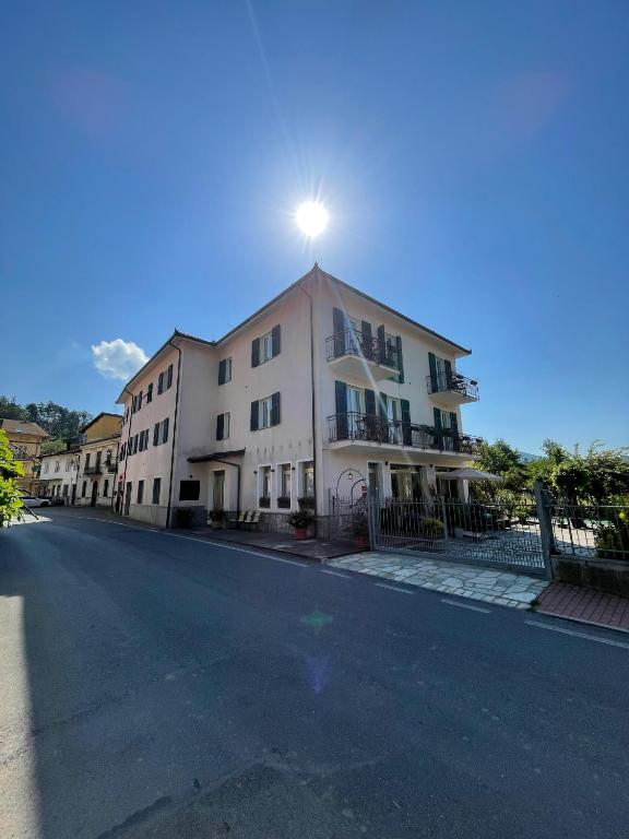 a building with a light on the top of it at Hotel Momora in Bardineto