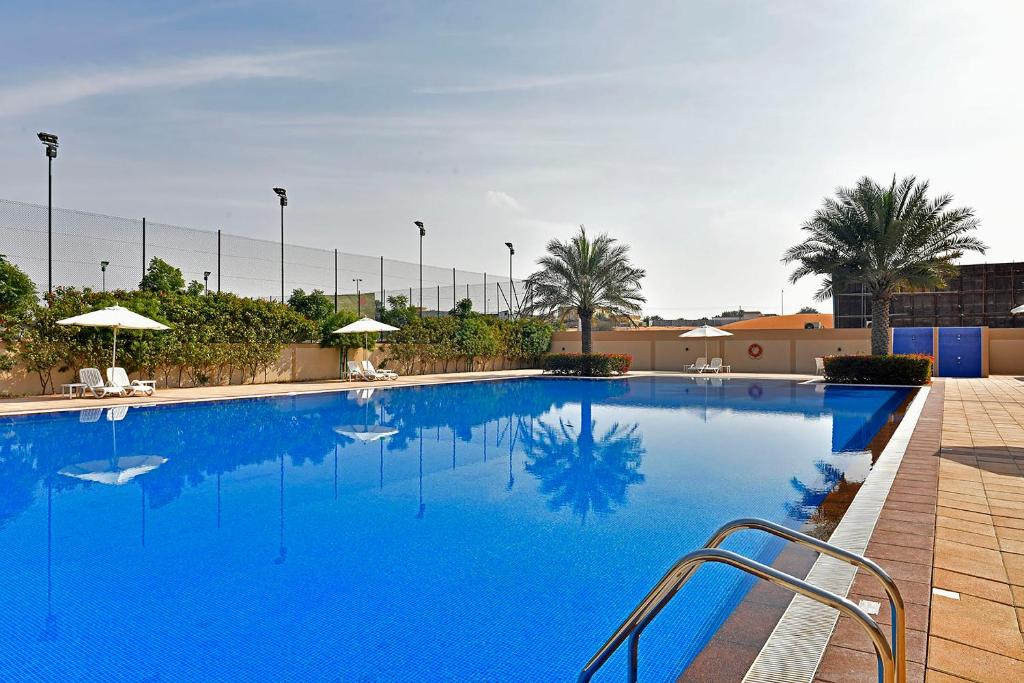 Bazén v ubytování Jannah Hotel Apartments & Villas nebo v jeho okolí