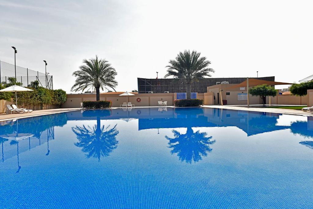 Bazén v ubytování Jannah Hotel Apartments & Villas nebo v jeho okolí