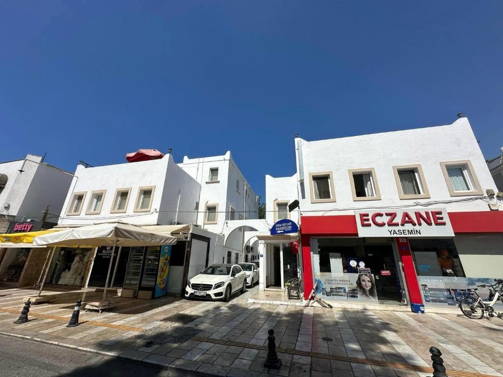 a group of buildings on a city street at CİELO Otel in Bodrum City