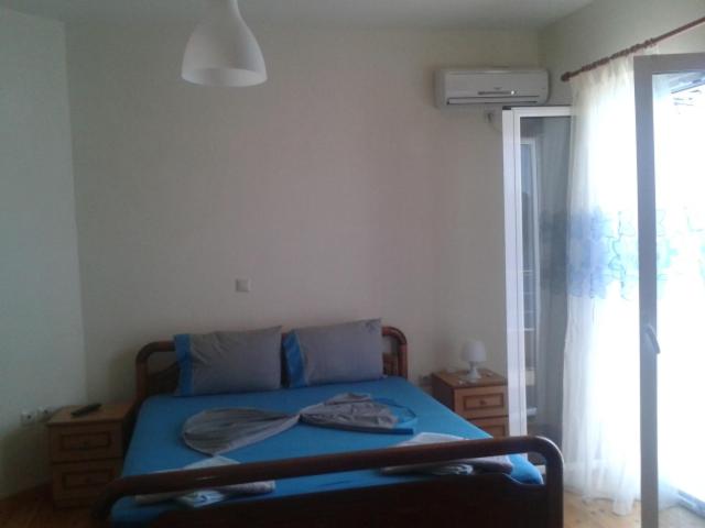 Postel nebo postele na pokoji v ubytování Magic Ionian Apartments & Rooms