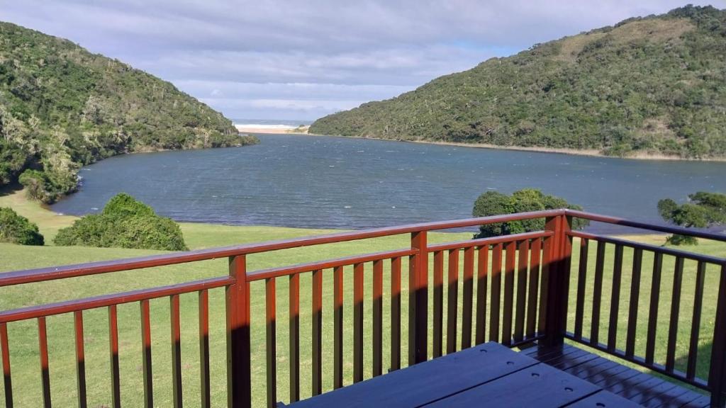 a view of a river from a balcony at Igoda Mouth Resort in Winterstrand