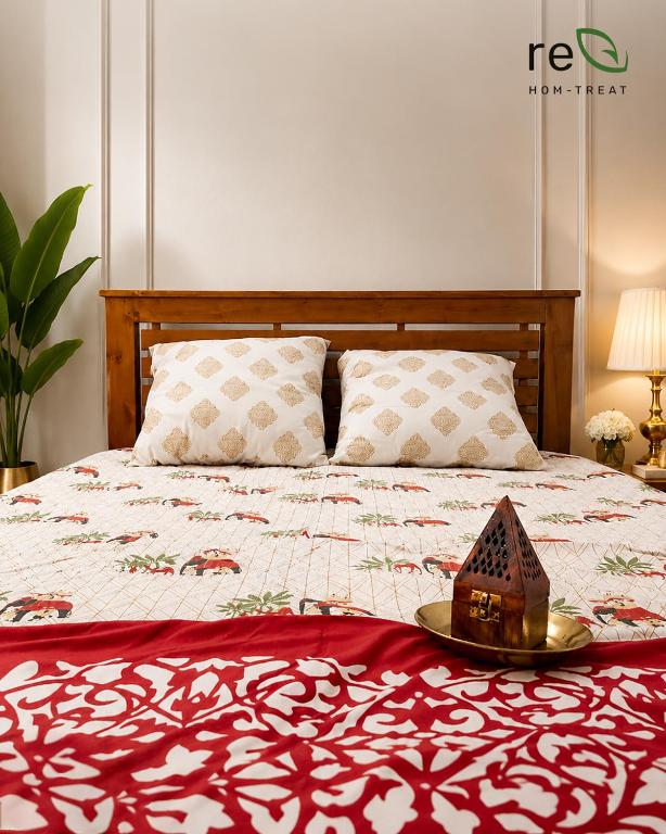 a bed with a plate of food on top of it at Re-Leaf Hom-Treat Homestay in Wayanad
