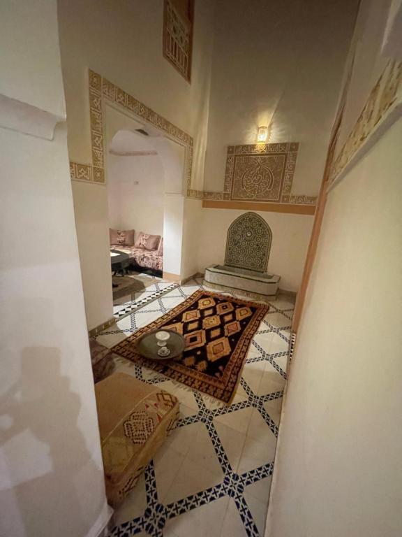 an entrance to a room with a tiled floor at Riad Marrakech Palacito in Marrakesh
