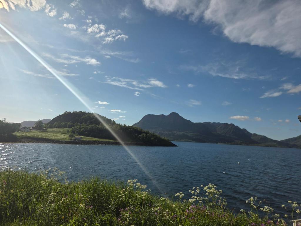a view of a body of water with a sprinkler at Grønningbrygga in Grønning