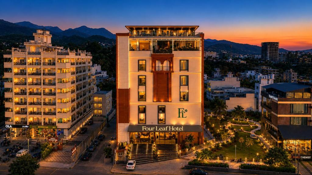 an aerial view of a hotel at night at Four Leaf Hotel Dehradun in Dehradun