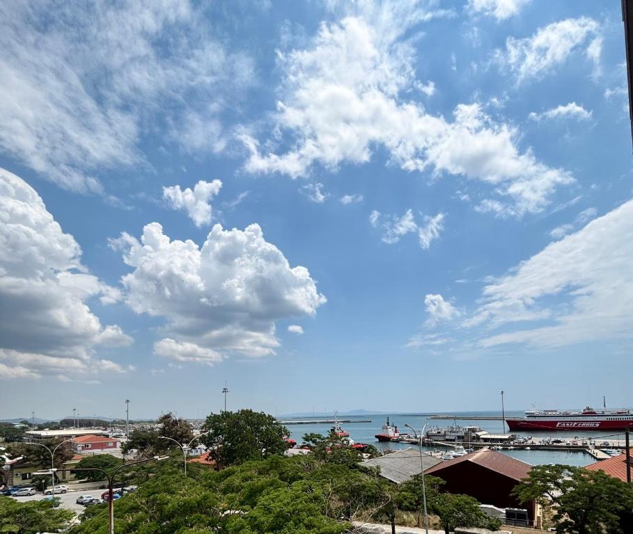 a view of the ocean and a cloudy sky at MariZot Apartment in Alexandroupoli