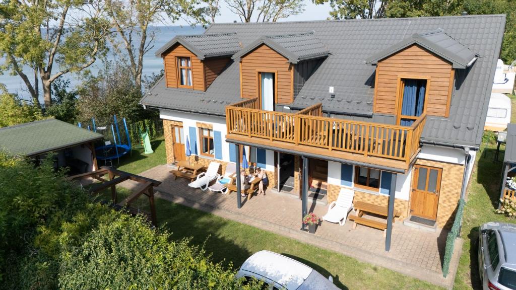 an aerial view of a house with a deck at Morena in Jarosławiec