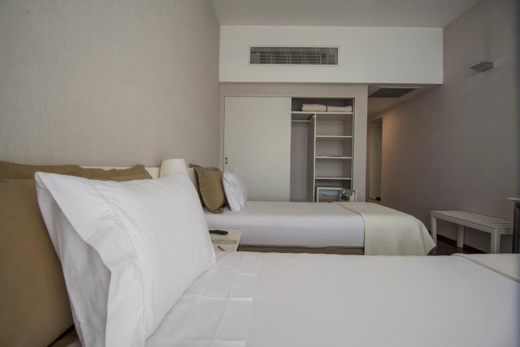 Postel nebo postele na pokoji v ubytování Hotel Guarani Asuncion