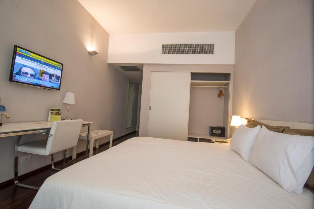 Postel nebo postele na pokoji v ubytování Hotel Guarani Asuncion