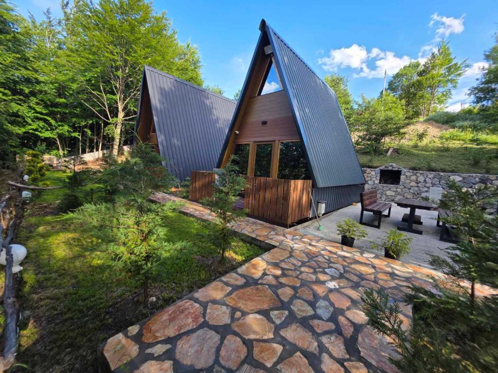 an overhead view of a house with a stone patio at Forest Heaven in Kolašin