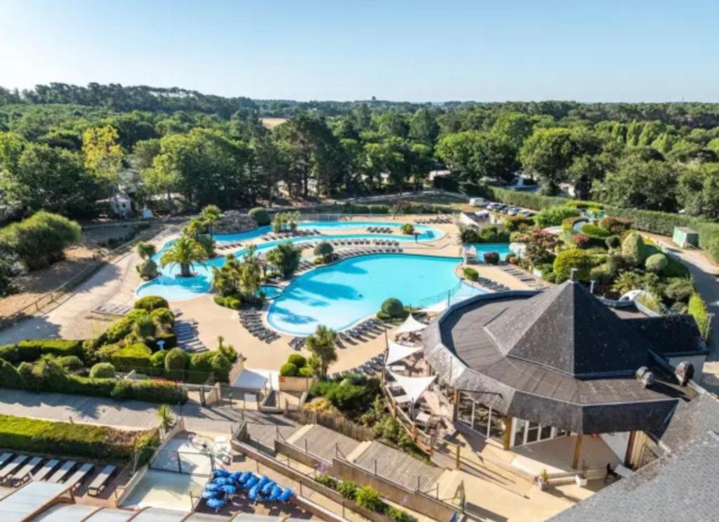 an aerial view of the pool at the resort at Camping Carnac in Carnac
